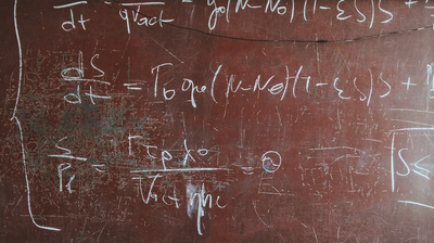 Picture of a blackboard with equations